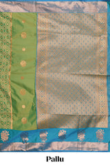 Green Semi soft silk sareecopperzari motifs with contrast border and pallu with a matchingblouse