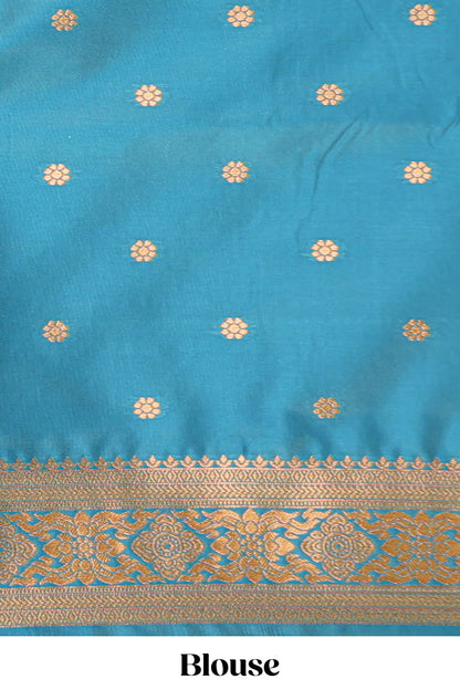 Green Semi soft silk saree  copper  zari motifs with contrast border and pallu with a matching  blouse