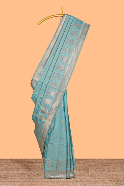 Sky blue semi soft silk saree silver motifs and matching floral zari border contrast pallu and blouse