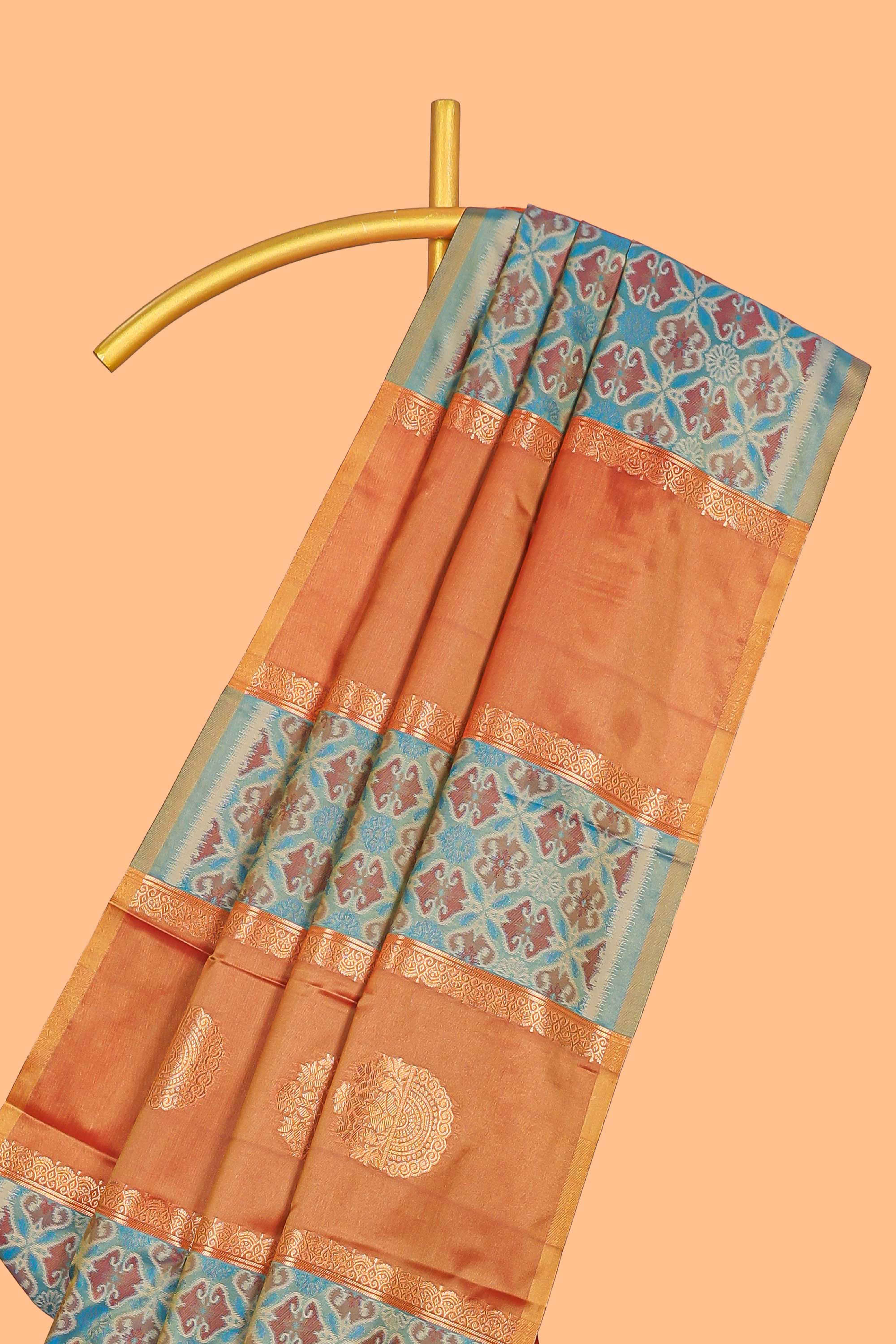 Rust orange semi soft silk saree patola printed body with zari border and rich contrast pallu with contrast blouse