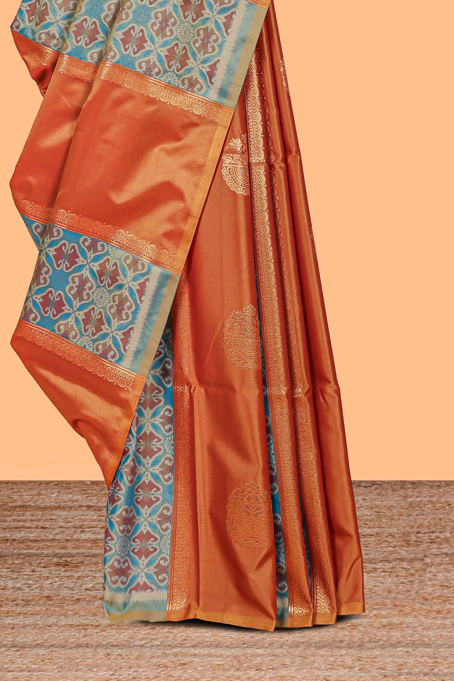 Rust orange semi soft silk saree patola printed body with zari border and rich contrast pallu with contrast blouse