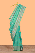 Green colour semi soft silk Woven Zari-Inspired Motifs and Geometric Weave Design border with contrast pallu and blouse