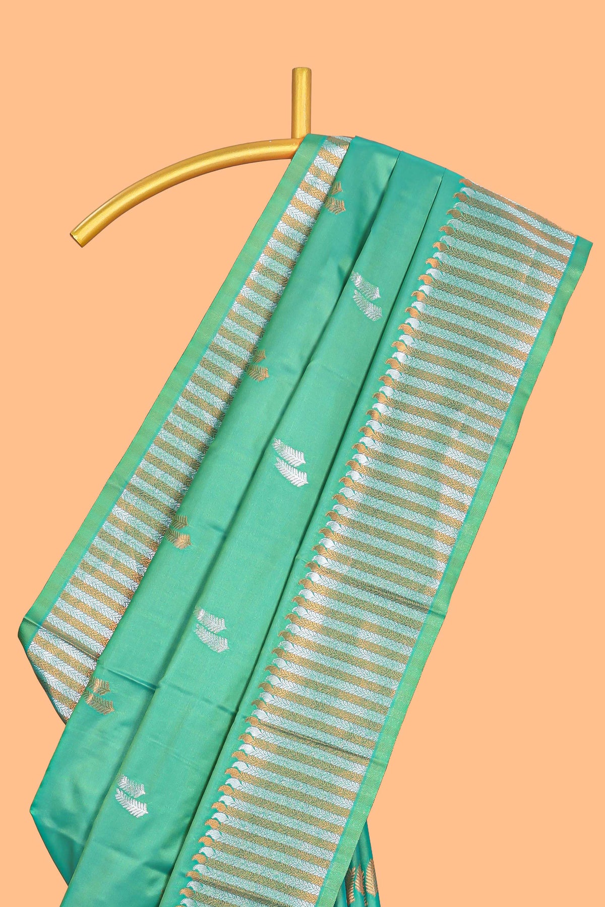 Green colour semi soft silk Woven Zari-Inspired Motifs and Geometric Weave Design border with contrast pallu and blouse