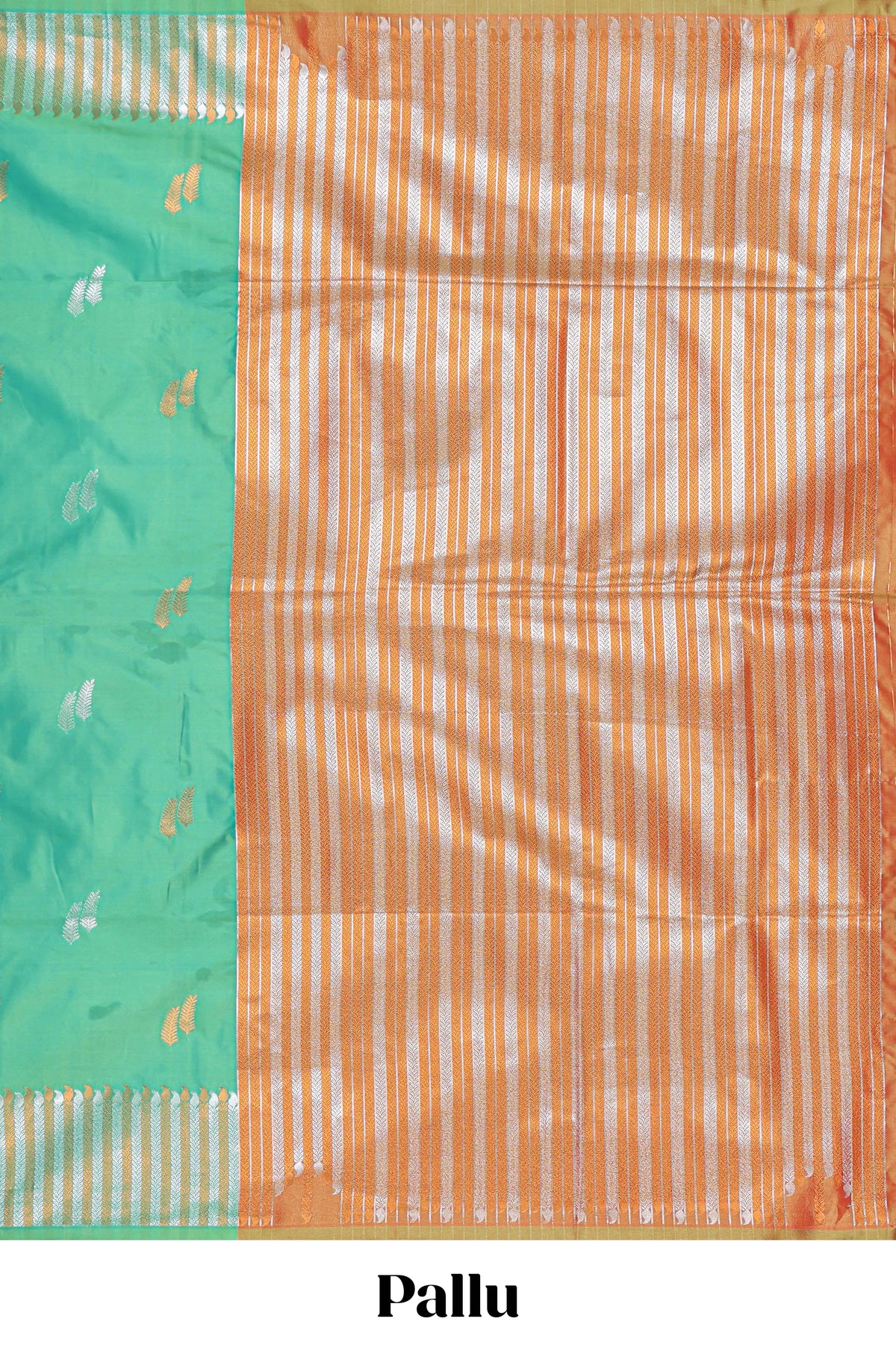 Green colour semi soft silk Woven Zari-Inspired Motifs and Geometric Weave Design border with contrast pallu and blouse