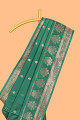 Bottle Green colour semi soft silk all over zari weave motifs with zari weaving border and contrast buttas weaving blouse