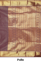 Brown colour semi soft silk all over checked pattern andContrast zari weaving border and Matching blouse