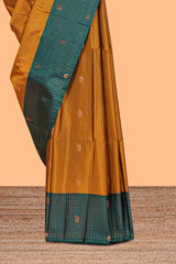 Mustard Yellow colour semi soft silk all over thread weave flower and stripes pattern with Contrast border and contrast buttas blouse