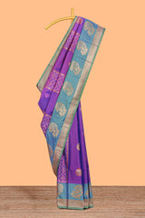 Royal Purple colour semi soft silk Zari-Woven Floral and Peacock Motifs with Gold-Tone Zari border and contrast buttas blouse
