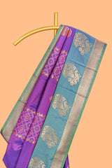 Royal Purple colour semi soft silk Zari-Woven Floral and Peacock Motifs with Gold-Tone Zari border and contrast buttas blouse