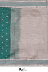 Green checked zari motifs design saree with self zari border and matching blouse