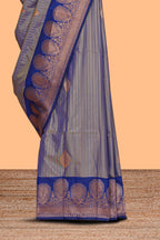 Grey zari striped motifs design semi soft silk saree with contrast border and blouse