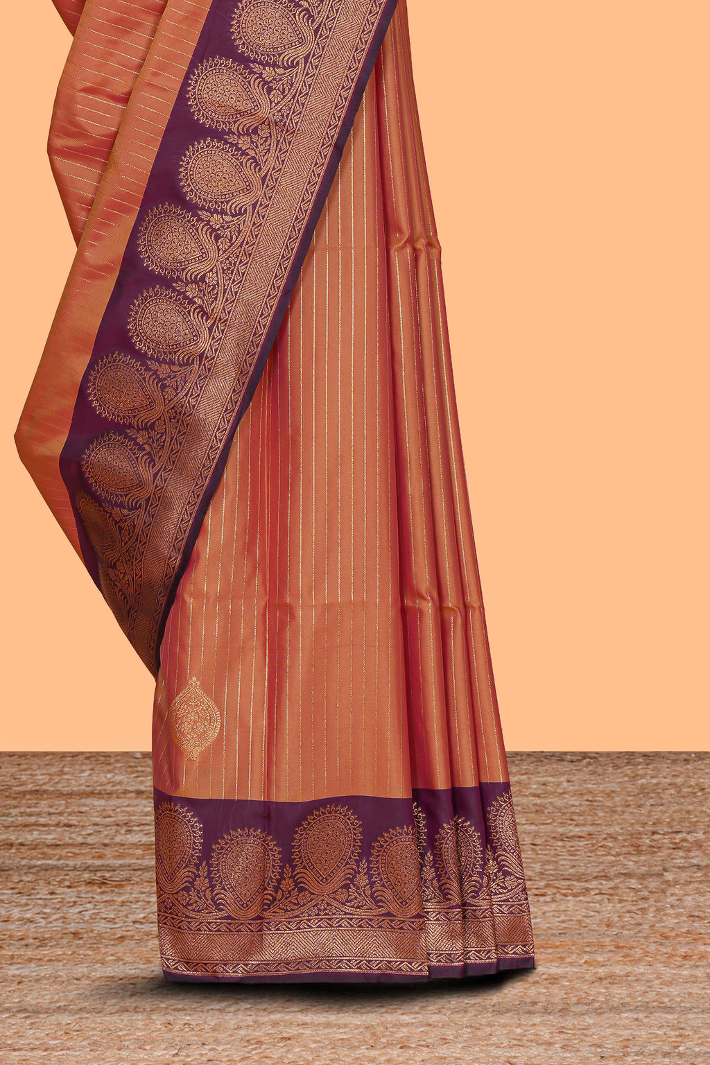 Orange striped zari motifs design semi soft silk saree with contrast zari border and motifs blouse