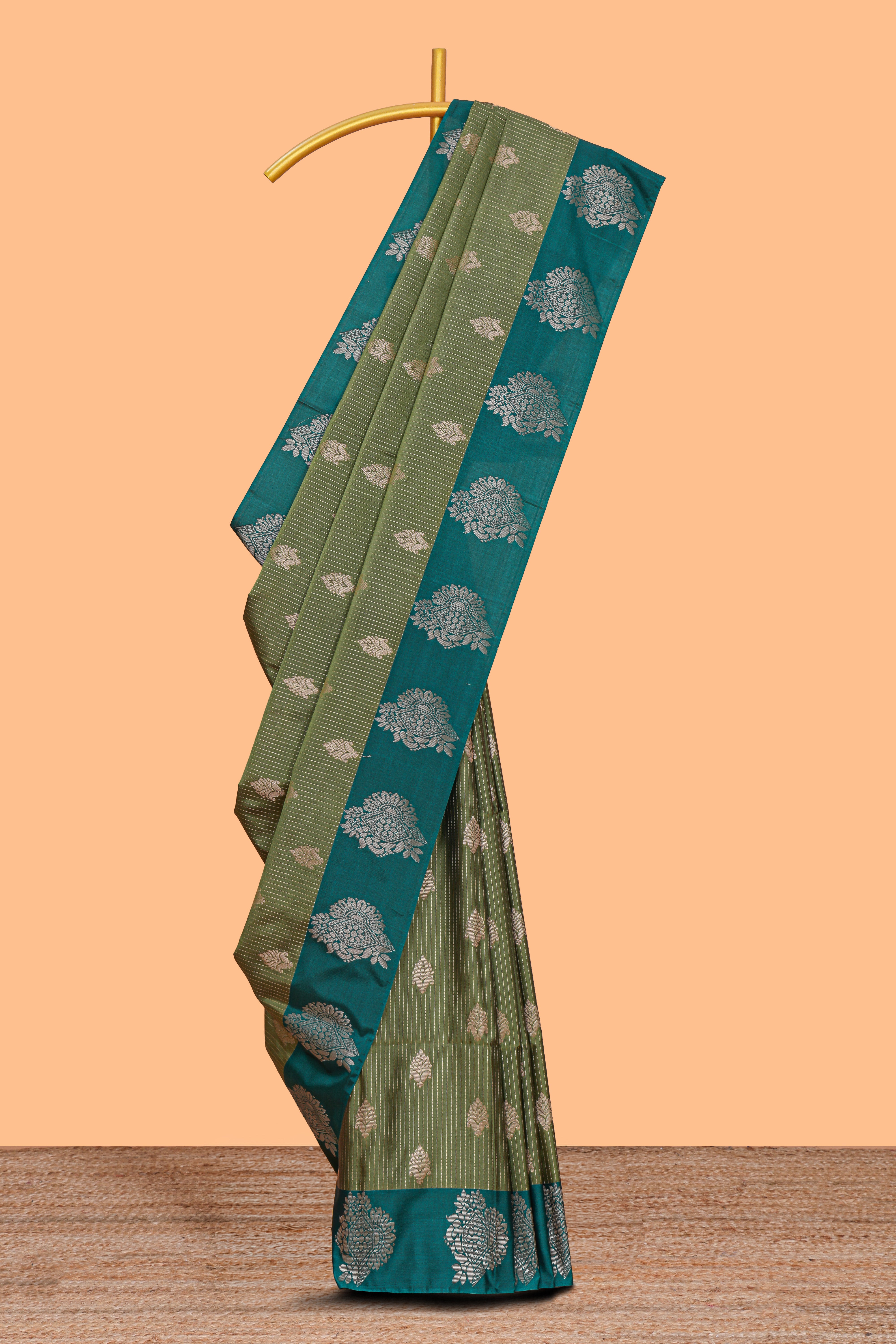 Green striped zari motifs design semi soft silk saree with contrast zari border and plain blouse