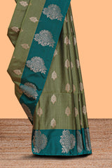 Green striped zari motifs design semi soft silk saree with contrast zari border and plain blouse