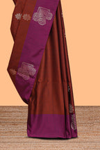 Rust orange zari motifs design semi soft silk saree with contrast zari border and plain blouse