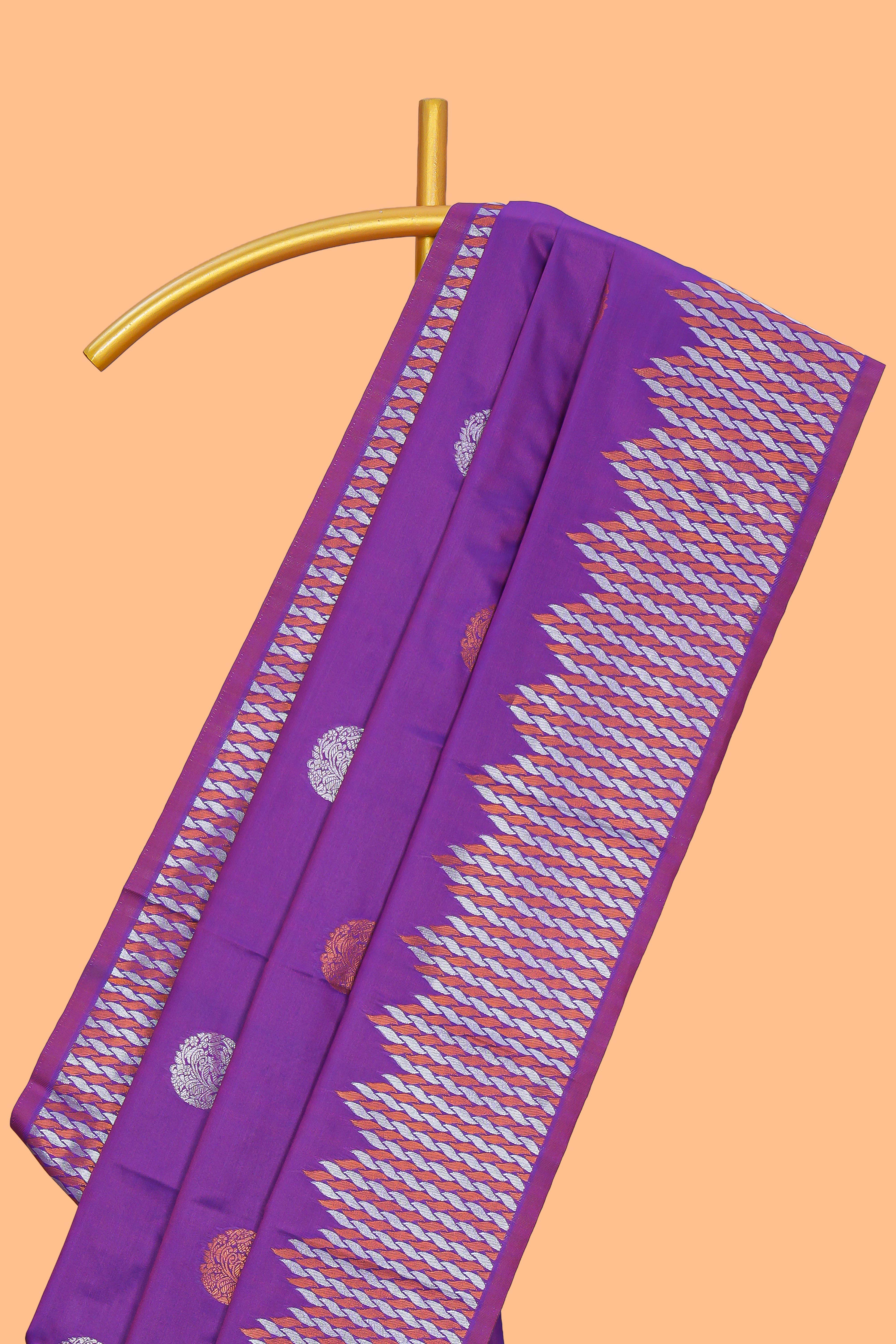 Electric lavender zari motifs design semi soft silk saree with self zari border and contrast motifs blouse