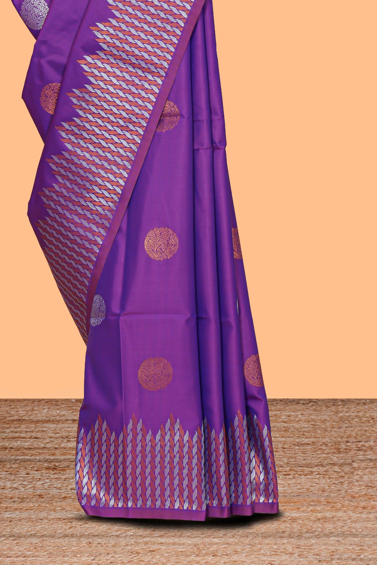 Electric lavender zari motifs design semi soft silk saree with self zari border and contrast motifs blouse