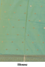 Faded peach zari motifs design semi soft silk saree with self zari border and contrast zari blouse