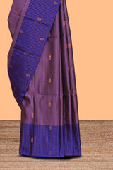 Mauve purple striped zari motifs design semi soft silk saree with contrast checked border andzari striped blouse