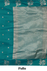 Borderless green floral zari motifs design semi soft silk saree with self pallu and matching blouse