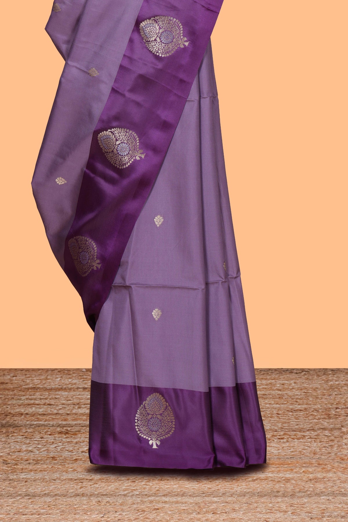 Lavender zari motifs design semi soft silk saree with contrast border and zari pallu