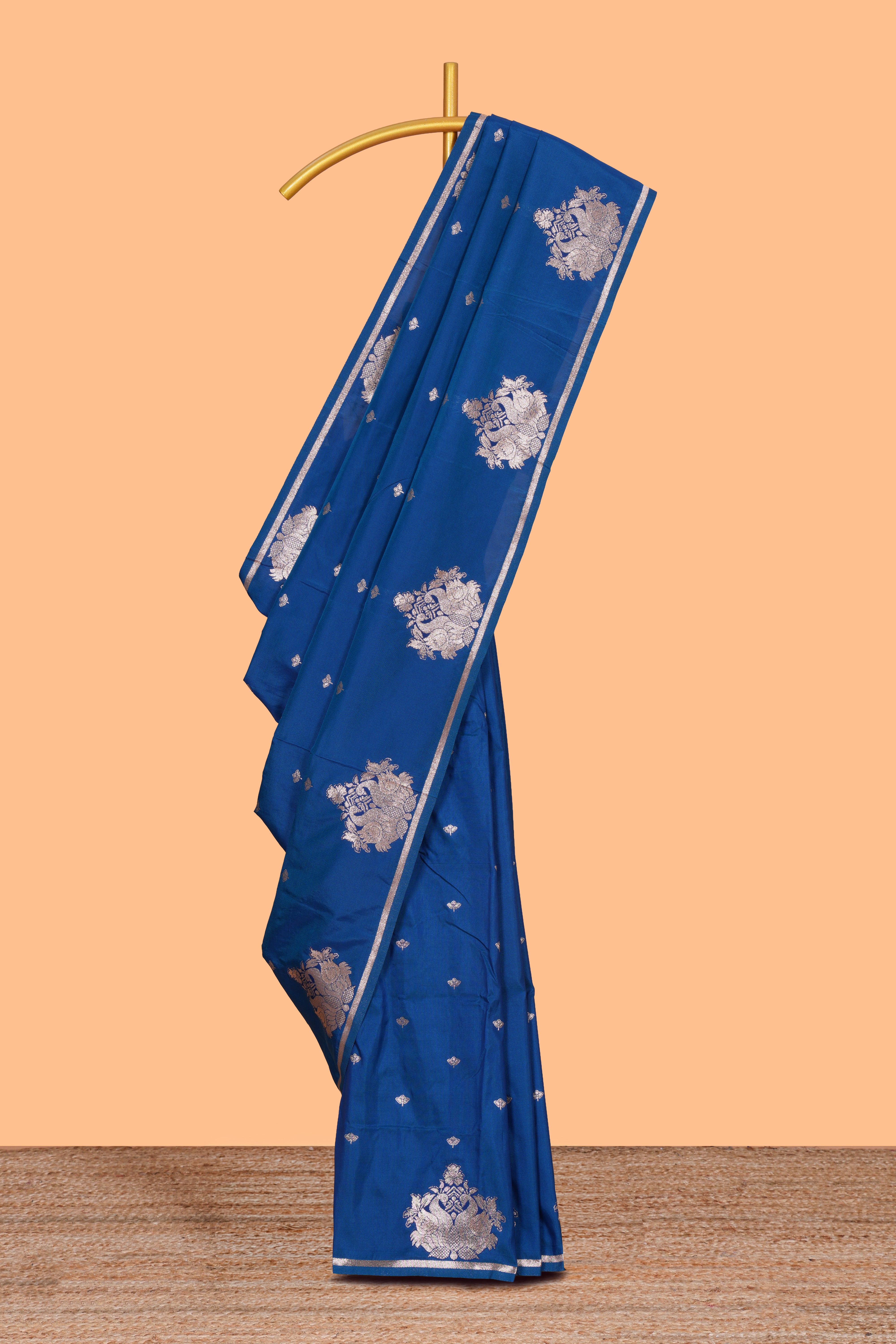 Borderless blue zari motifs design semi soft silk saree with self pallu and matching blouse