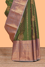 Green unique zari design semi soft Silk Saree with contrast zari border and zari blouse