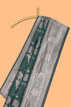 Green zari design semi soft silk saree with self zari border and matching blouse