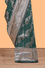 Green zari design semi soft silk saree with self zari border and matching blouse