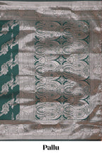 Green zari design semi soft silk saree with self zari border and matching blouse