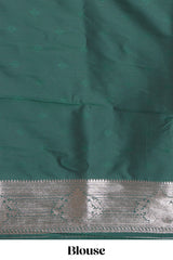 Green zari design semi soft silk saree with self zari border and matching blouse