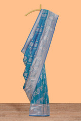 Blue zari design semi soft silk saree with self zari border and matching blouse