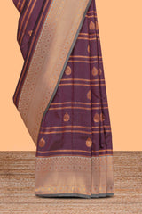 Wine purple striped motifs design semi soft silk saree with contrast border and zari motifs blouse