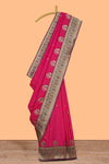 Rani pink peacock design zari motifs semi soft silk saree with contrast zari border and blouse