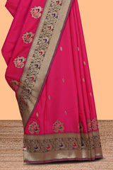 Rani pink peacock design zari motifs semi soft silk saree with contrast zari border and blouse