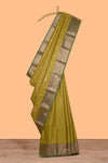 Green checked zari motifs design semi soft silk saree with contrast zari border and blouse