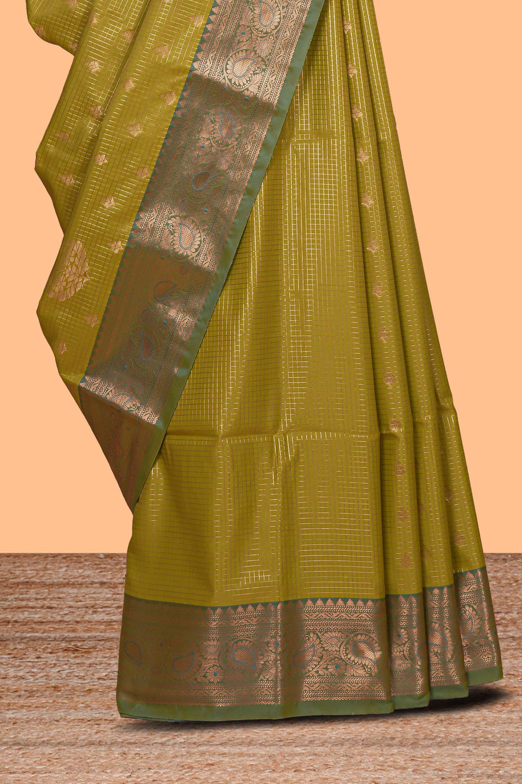 Green checked zari motifs design semi soft silk saree with contrast zari border and blouse