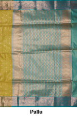 Green checked zari motifs design semi soft silk saree with contrast zari border and blouse