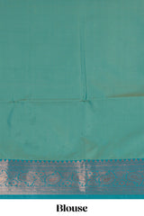 Green checked zari motifs design semi soft silk saree with contrast zari border and blouse
