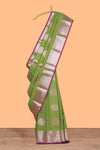 Green zari motifs design semi soft silk saree with contrast zari border and blouse