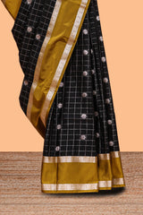 Black checked floral zari motifs design semi soft silk saree with contrast border and blouse