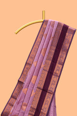 Lavender checked zari motifs design semi soft silk saree with contrast border and zari blouse