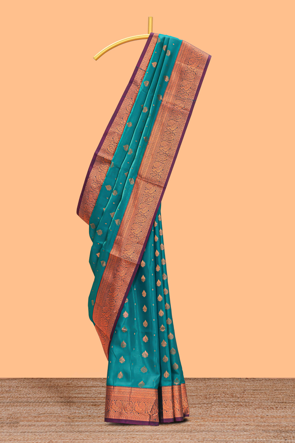 Green floral zari motifs design semi soft silk saree with contrast zari border and blouse