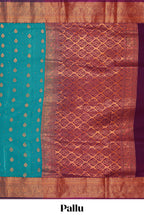 Green floral zari motifs design semi soft silk saree with contrast zari border and blouse
