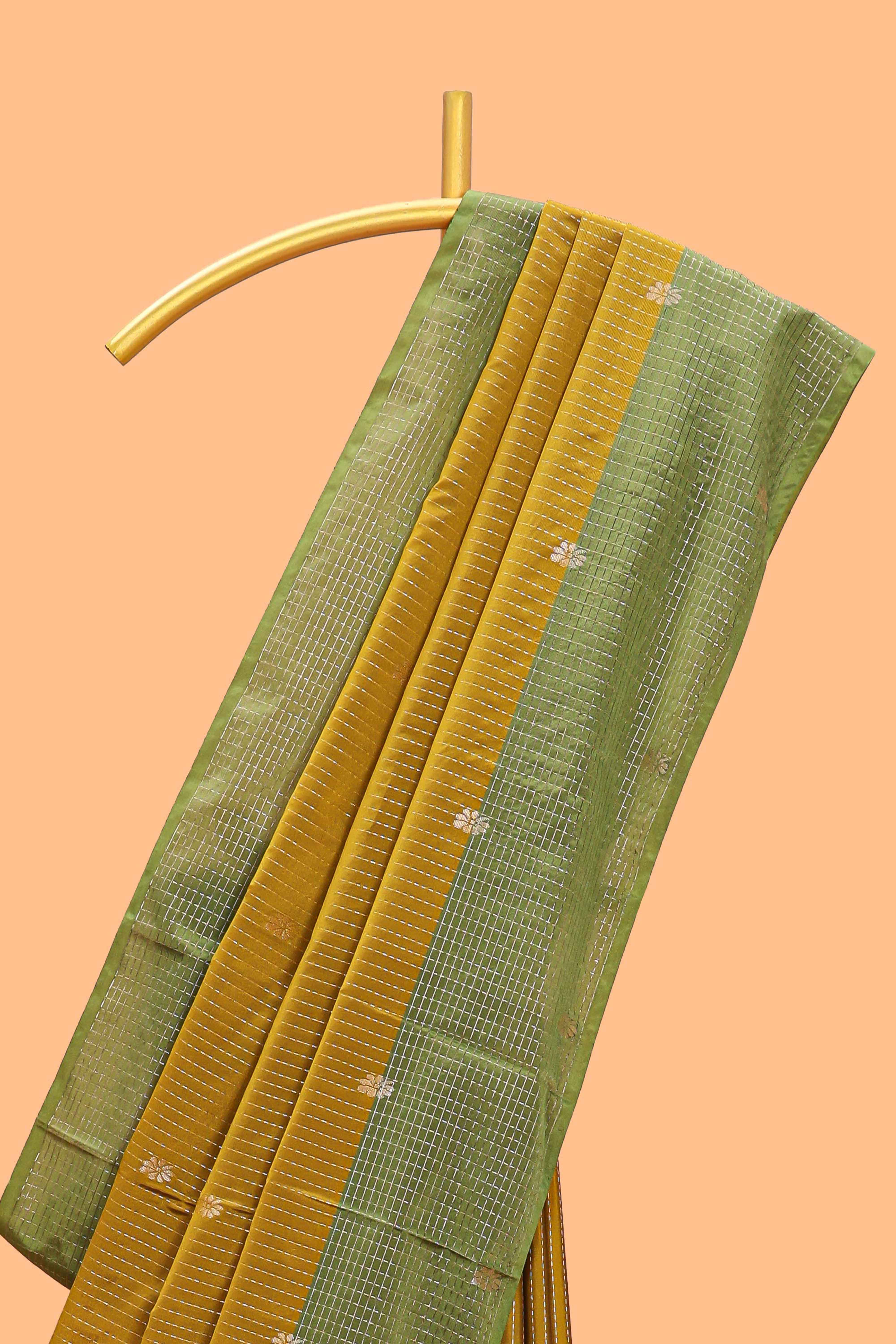 Mustard striped floral zari motifs design semi soft silk saree with contrast zari border and blouse