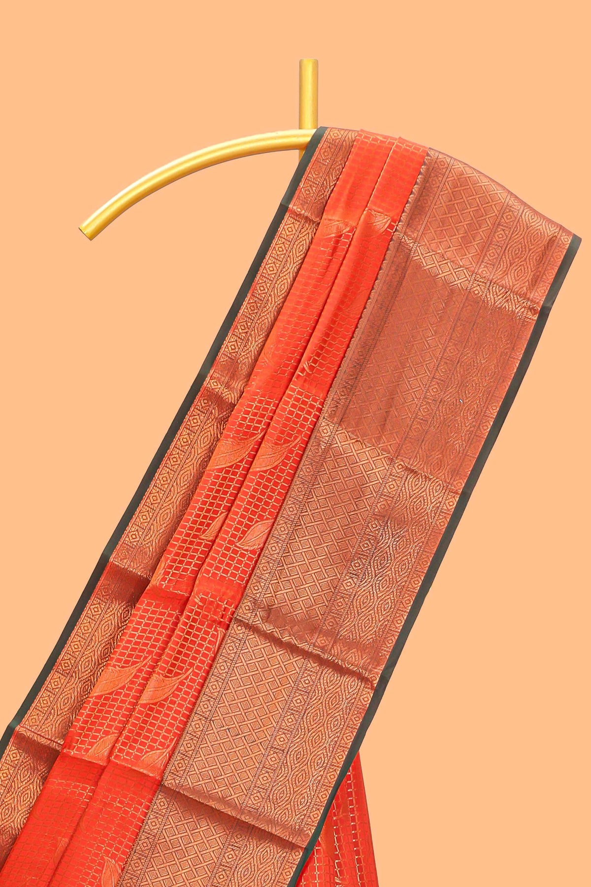 Orange checked leaf zari motifs design semi soft silk saree with contrast zari border and blouse