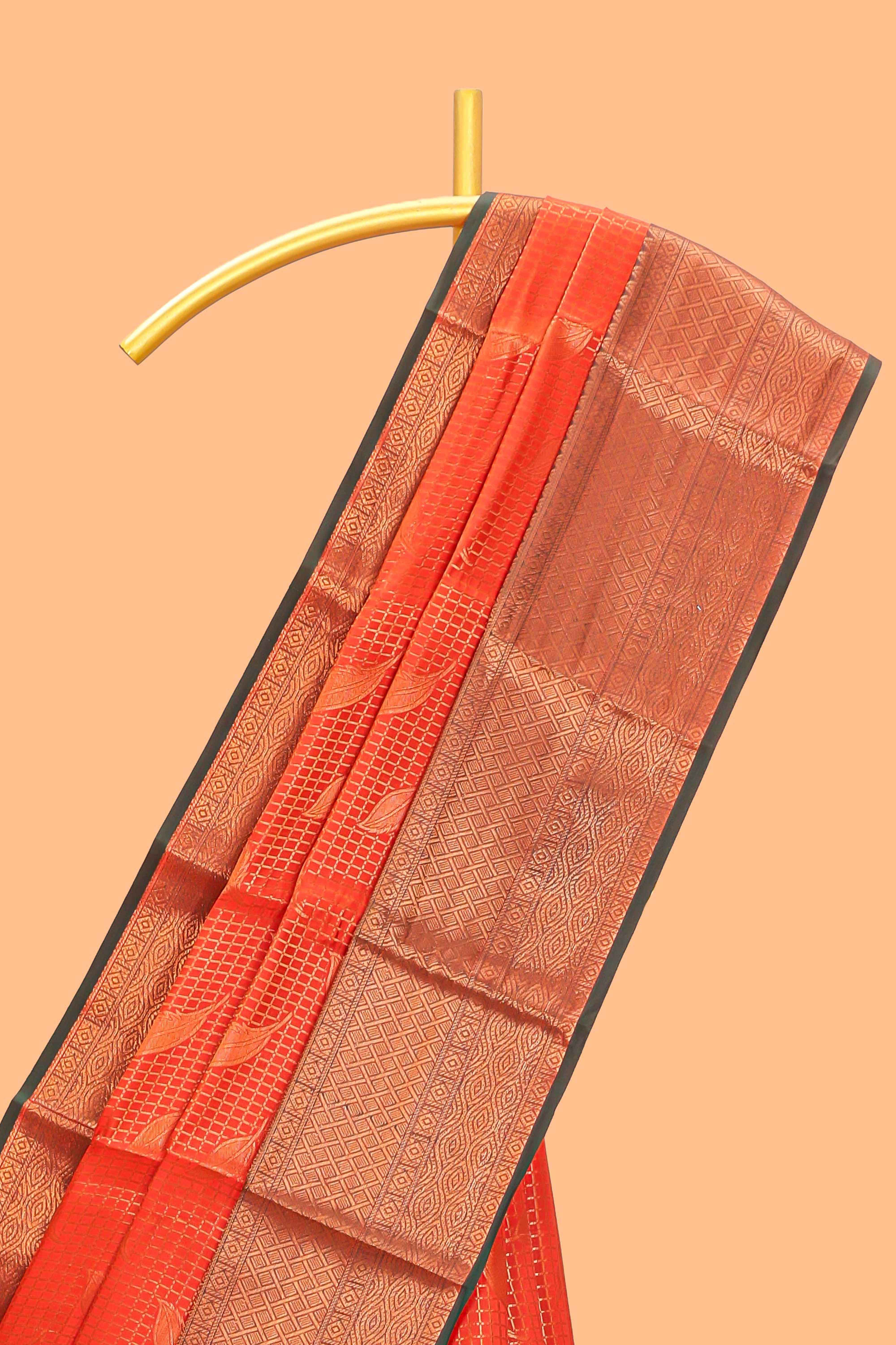 Orange checked leaf zari motifs design semi soft silk saree with contrast zari border and blouse