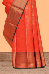 Orange checked leaf zari motifs design semi soft silk saree with contrast zari border and blouse