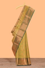 Green checked zari motifs design semi soft silk saree with contrast border and zari blouse