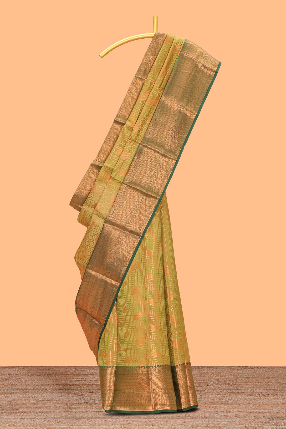 Green checked zari motifs design semi soft silk saree with contrast border and zari blouse